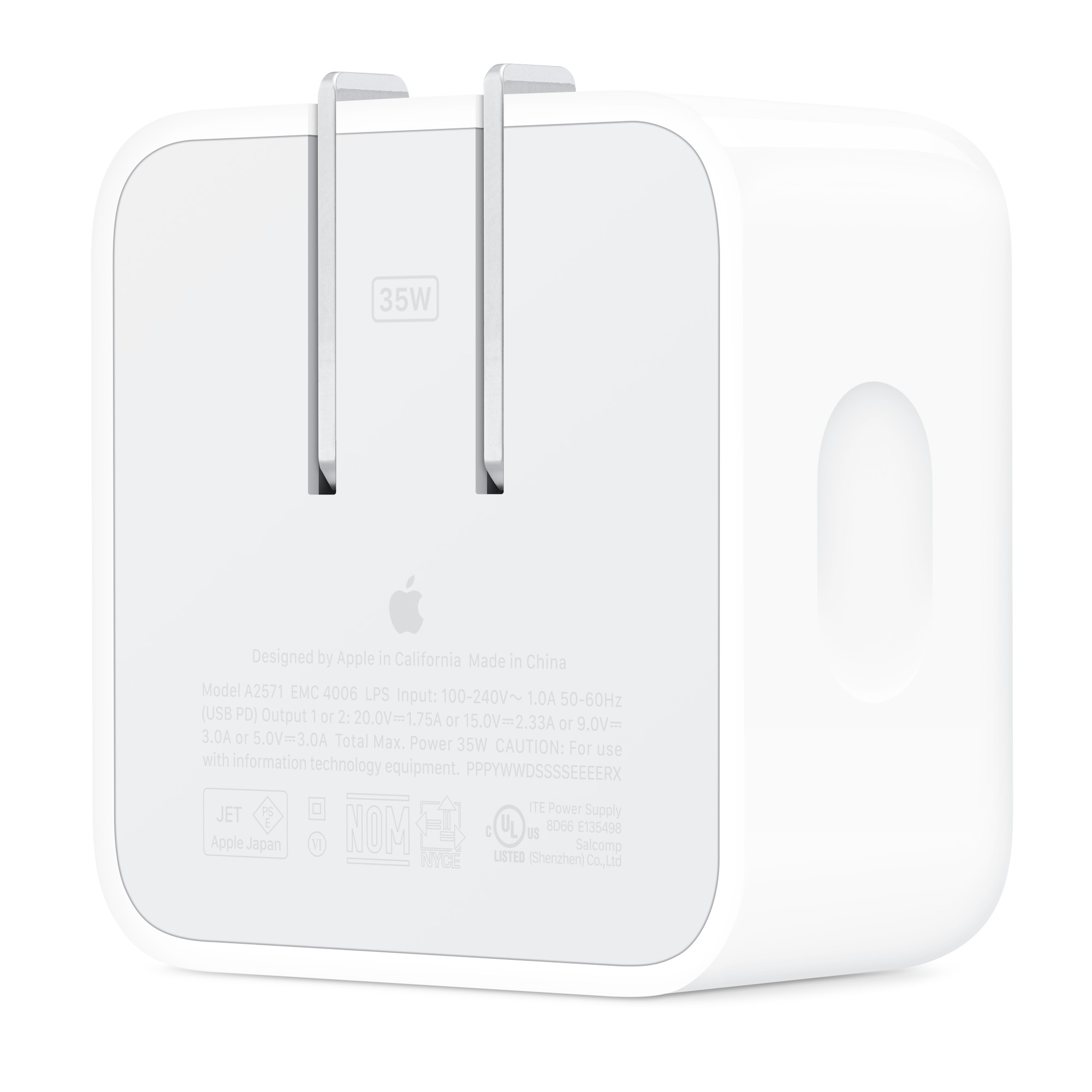 プラグを折りたたんだ本体背面。35W表記と収納された2本の刃（画像：Apple）